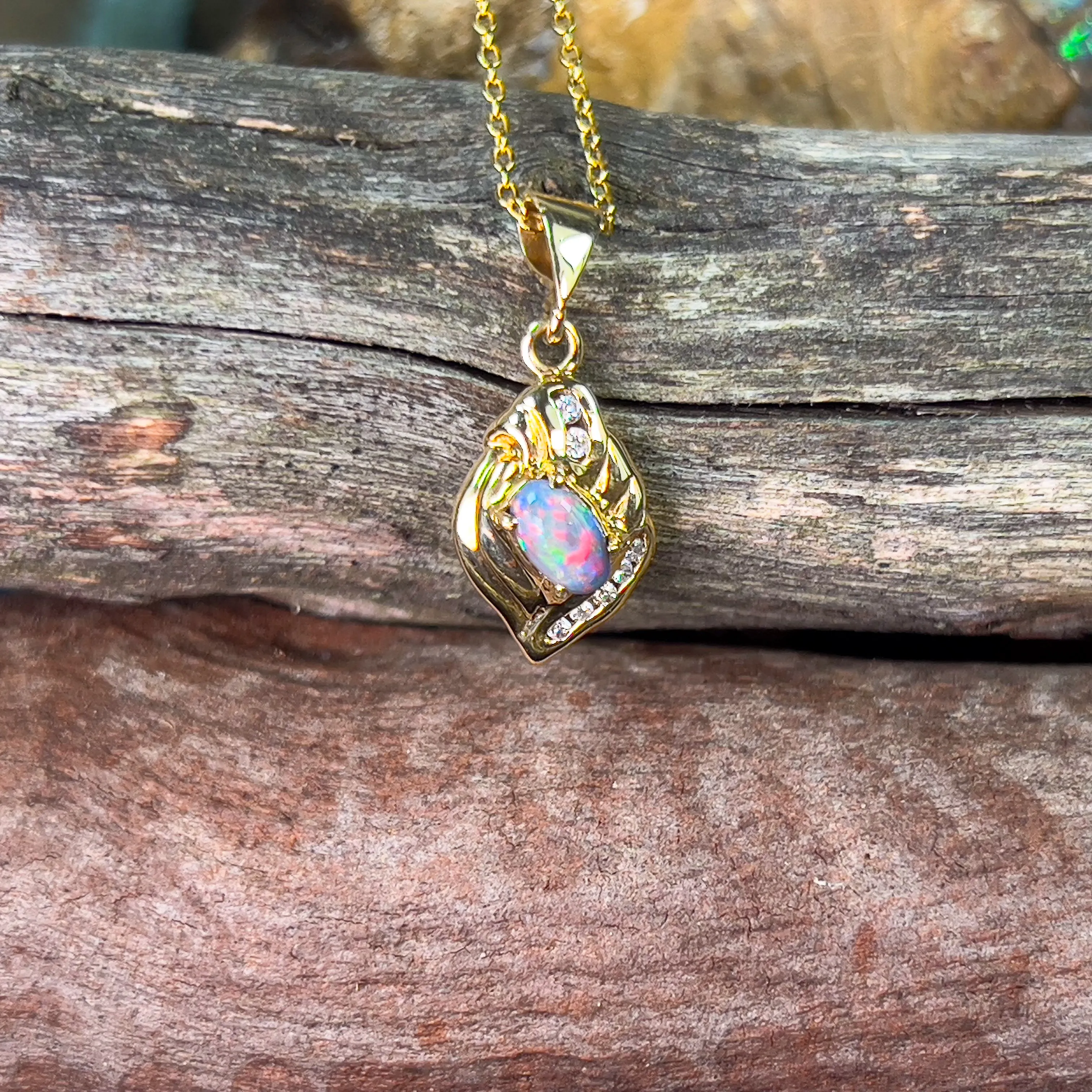 18kt Yellow Gold Black Opal 0.45ct pendant